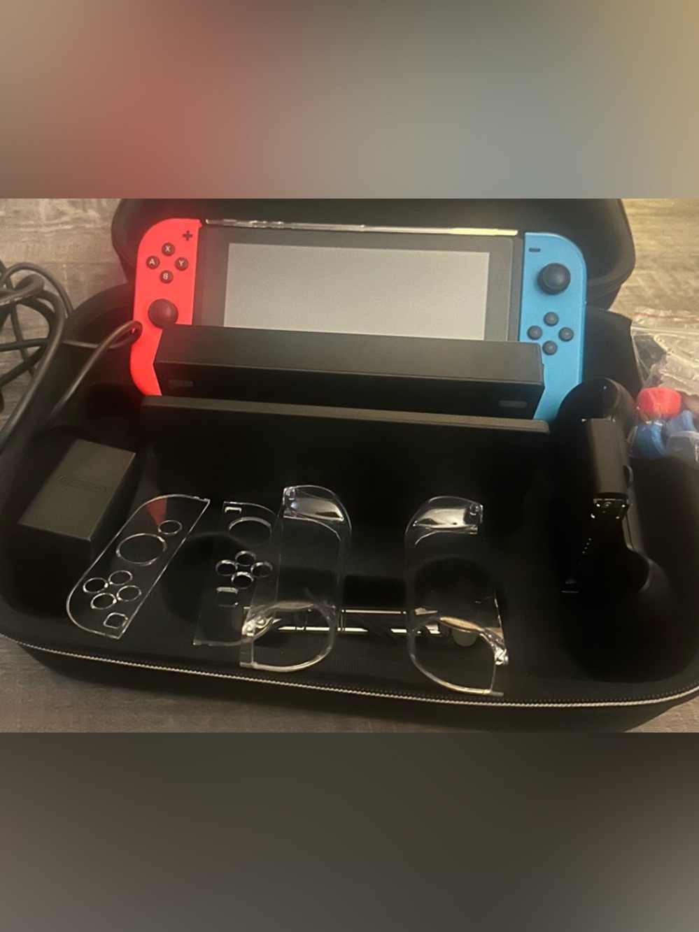 Nintendo Switch with Neon Blue & Neon Red Joy-Con and Clear Accessory Set